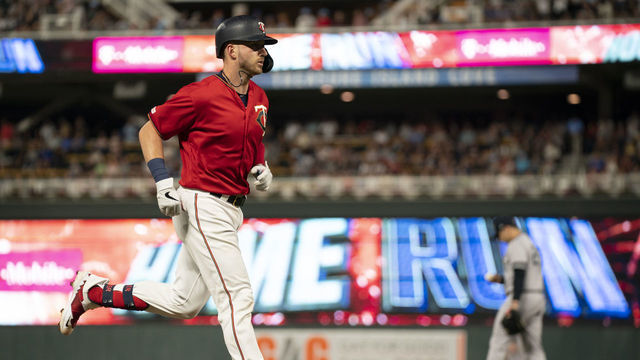 Minneapolis, MN-July 22: Minnesota Twins catcher Mitch Garver (18) trotted home after hitting a solo home run in the 6th inning off New York Yankees relief pitcher Luis Cessa, rear at Target Field.