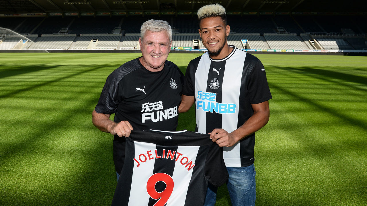 NEWCASTLE UPON TYNE, ENGLAND - JULY 22: Joelinton (R) poses for a photograph with Newcastle United Head Coach Steve Bruce (L) during a photoshoot at St.James' Park on July 22, 2019 in Newcastle upon Tyne, England.