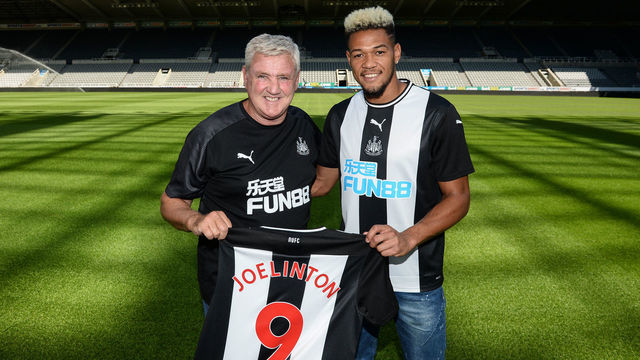 NEWCASTLE UPON TYNE, ENGLAND - JULY 22: Joelinton (R) poses for a photograph with Newcastle United Head Coach Steve Bruce (L) during a photoshoot at St.James' Park on July 22, 2019 in Newcastle upon Tyne, England.