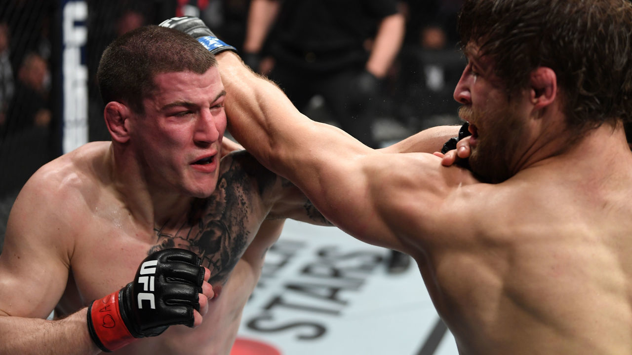 OTTAWA, ON - MAY 04: (L-R) Marc-Andre Barriault of Canada and Andrew Sanchez exchange punches in their middleweight bout during the UFC Fight Night event at Canadian Tire Centre on May 4, 2019 in Ottawa, Ontario, Canada.
