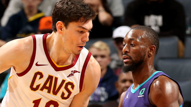 CHARLOTTE, NC - November 3: Cedi Osman #16 of the Cleveland Cavaliers handles the ball Kemba Walker #15 of the Charlotte Hornets on November 3, 2018 at Spectrum Center in Charlotte, North Carolina. NOTE TO USER: User expressly acknowledges and agrees that, by downloading and/or using this Photograph, user is consenting to the terms and conditions of the Getty Images License Agreement. Mandatory Copyright Notice: Copyright 2018 NBAE