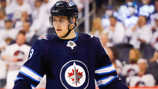 WINNIPEG, MB - APRIL 12: Andrew Copp #9 of the Winnipeg Jets looks on during a third period stoppage in play against the St. Louis Blues in Game Two of the Western Conference First Round during the 2019 NHL Stanley Cup Playoffs at the Bell MTS Place on April 12, 2019 in Winnipeg, Manitoba, Canada. The Blues defeated the Jets 4-3 to lead the series 2-0.