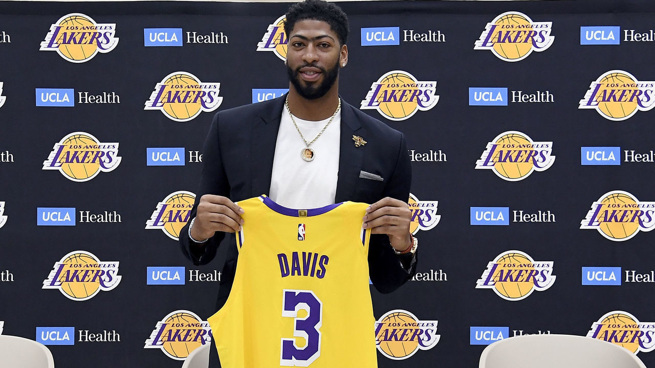 EL SEGUNDO, CALIFORNIA - JULY 13: Anthony Davis poses with his jersey as he is introduced as the newest player of the Los Angeles Lakers during a press conference at UCLA Health Training Center on July 13, 2019 in El Segundo, California. NOTE TO USER: User expressly acknowledges and agrees that, by downloading and/or using this Photograph, user is consenting to the terms and conditions of the Getty Images License Agreement.