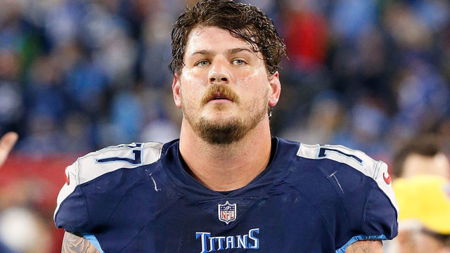 NASHVILLE, TN - DECEMBER 30: Taylor Lewan #77 of the Tennessee Titans watches from the sideline during a game against the Indianapolis Colts at Nissan Stadium on December 30, 2018 in Nashville, Tennessee.