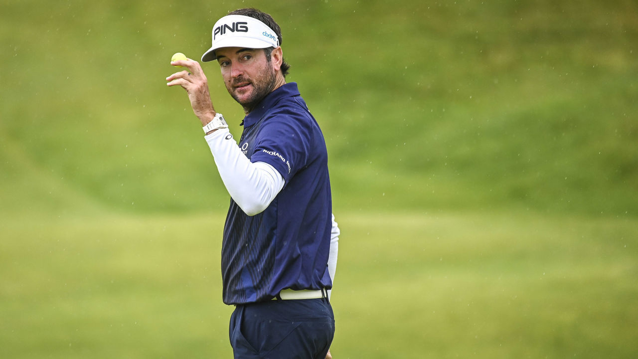 PORTRUSH, NORTHERN IRELAND - JULY 19: Bubba Watson waves his ball to fans after making a birdie putt on the 12th hole green during the second round of the 148th Open Championship held on the Dunluce Links at Royal Portrush Golf Club on July 19, 2019 in Portrush, United Kingdom.
