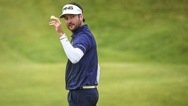 PORTRUSH, NORTHERN IRELAND - JULY 19: Bubba Watson waves his ball to fans after making a birdie putt on the 12th hole green during the second round of the 148th Open Championship held on the Dunluce Links at Royal Portrush Golf Club on July 19, 2019 in Portrush, United Kingdom.