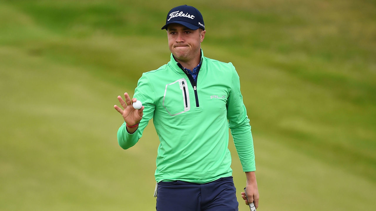 US golfer Justin Thomas reacts after putting in on the 2nd hole during the second round of the British Open golf Championships at Royal Portrush golf club in Northern Ireland on July 19, 2019.