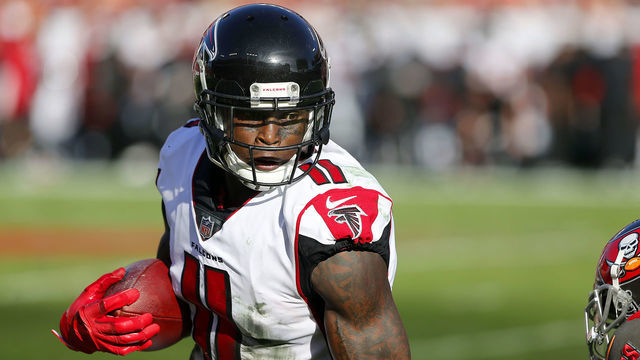TAMPA, FL - DEC 30: Julio Jones (11) of the Falcons makes a catch and turns upfield during the regular season game between the Atlanta Falcons and the Tampa Bay Buccaneers on December 30, 2018 at Raymond James Stadium in Tampa, Florida.