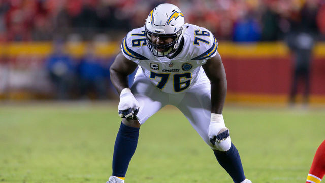 KANSAS CITY, MO - DECEMBER 13: Los Angeles Chargers offensive tackle Russell Okung (76) on the line during the NFL AFC West game against the Kansas City Chiefs on December 13, 2018 at Arrowhead Stadium in Kansas City, Missouri.