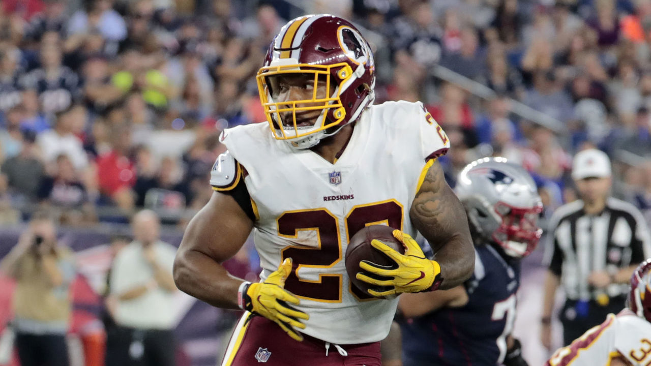 FOXBOROUGH, MA - AUGUST 09: Washington Redskins running back Derrius Guice (29) carries the ball during a preseason NFL game between the New England Patriots and the Washington Redskins on August 9, 2018, at Gillette Stadium in Foxborough, Massachusetts. The Patriots defeated the Redskins 26-17.
