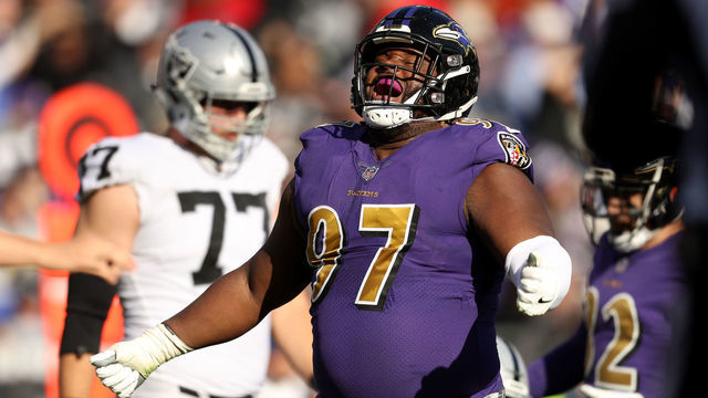 BALTIMORE, MARYLAND - NOVEMBER 25: Defensive Tackle Michael Pierce #97 of the Baltimore Ravens reacts after a play in the first quarter against the Oakland Raiders at M&T Bank Stadium on November 25, 2018 in Baltimore, Maryland.