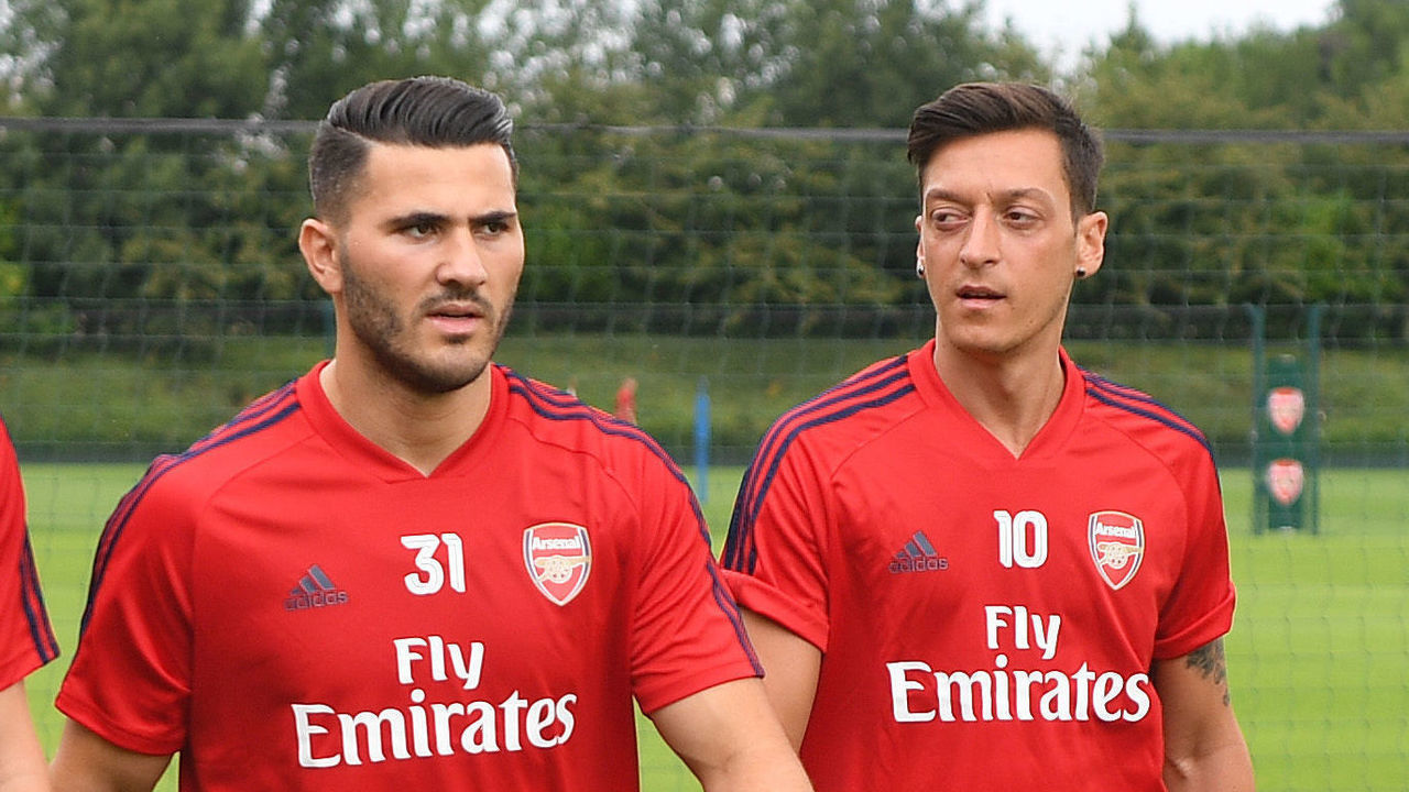 ST ALBANS, ENGLAND - JULY 06: (L-R) Shkodran Mustafi, Sead Kolasinac and Mesut Ozil of Arsenal during a training session at London Colney on July 06, 2019 in St Albans, England.