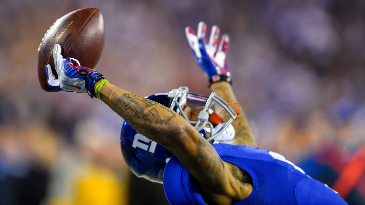 November 23, 2014: New York Giants wide receiver Odell Beckham (13) makes a 43 yard touchdown catch during the second quarter during a NFL game between the Dallas Cowboys and New York Giants at MetLife Stadium in East Rutherford, NJ The Cowboys defeated the Giants 31-28.