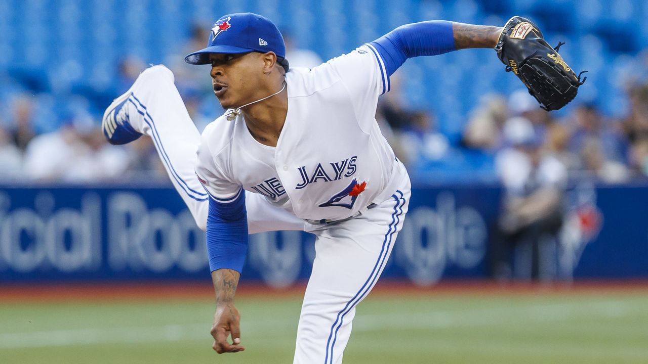 TORONTO, ONTARIO - JULY 24: Marcus Stroman #6 of the Toronto Blue Jays pitches against the Cleveland Indians in the third inning during their MLB game at the Rogers Centre on July 24, 2019 in Toronto, Canada.