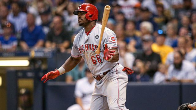 MILWAUKEE, WISCONSIN - JULY 22: Yasiel Puig #66 of the Cincinnati Reds hits a double in the sixth inning against the Milwaukee Brewers at Miller Park on July 22, 2019 in Milwaukee, Wisconsin.