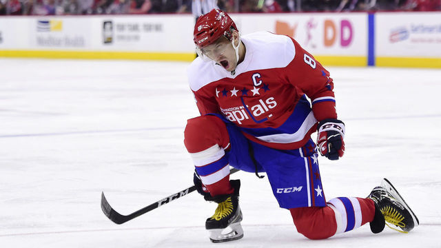 WASHINGTON, DC - MARCH 26: Alex Ovechkin #8 of the Washington Capitals celebrates after scoring a goal in the third period against the Carolina Hurricanes at Capital One Arena on March 26, 2019 in Washington, DC.