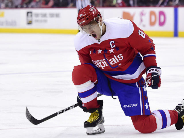 WASHINGTON, DC - MARCH 26: Alex Ovechkin #8 of the Washington Capitals celebrates after scoring a goal in the third period against the Carolina Hurricanes at Capital One Arena on March 26, 2019 in Washington, DC.