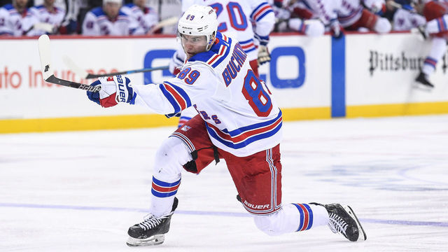 PITTSBURGH, PA - APRIL 06: New York Rangers Right Wing Pavel Buchnevich (89) shoots the puck during the third period in the NHL game between the Pittsburgh Penguins and the New York Rangers on April 6, 2019, at PPG Paints Arena in Pittsburgh, PA.