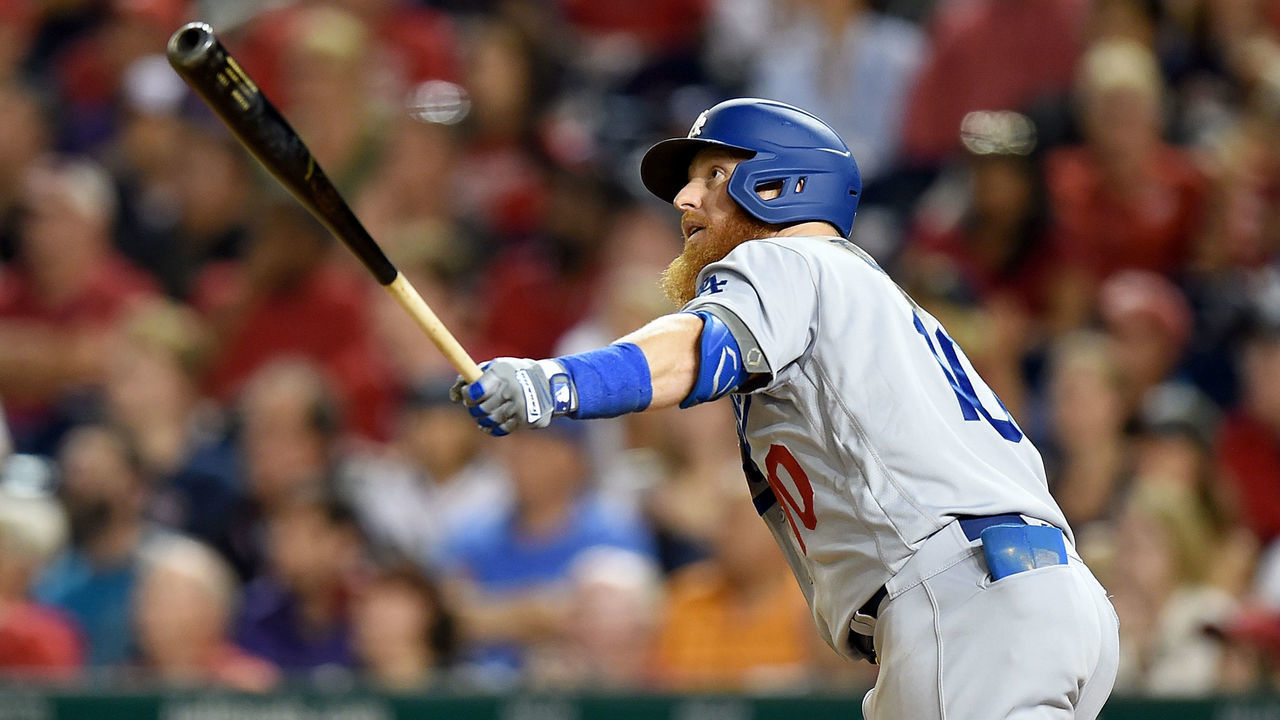 WASHINGTON, DC - JULY 26: Justin Turner #10 of the Los Angeles Dodgers hits a three-run home run in the eighth inning against the Washington Nationals at Nationals Park on July 26, 2019 in Washington, DC.