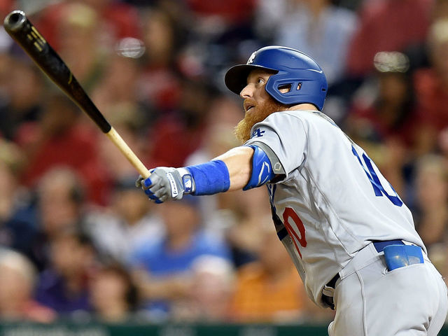 WASHINGTON, DC - JULY 26: Justin Turner #10 of the Los Angeles Dodgers hits a three-run home run in the eighth inning against the Washington Nationals at Nationals Park on July 26, 2019 in Washington, DC.