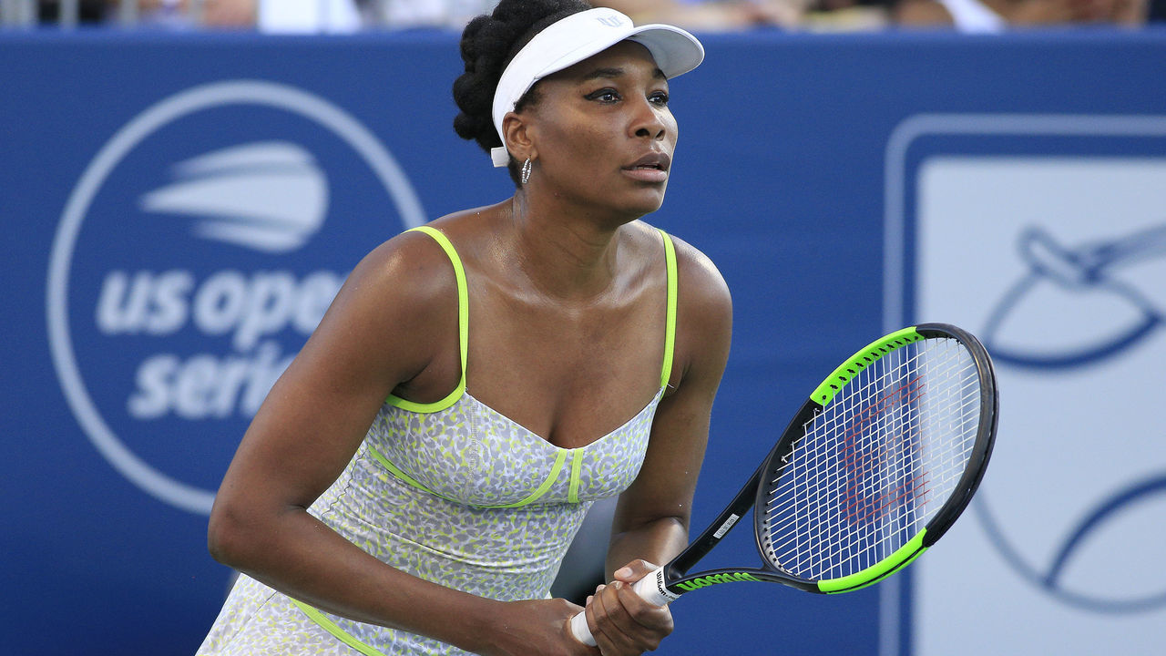ATLANTA, GA - JULY 21: Venus Williams prepares to return serve during the exhibition tennis match between Venus Williams and Madison Keys on July 21, 2019 at Stadium Court in Atlantic Station in Atlanta, GA.