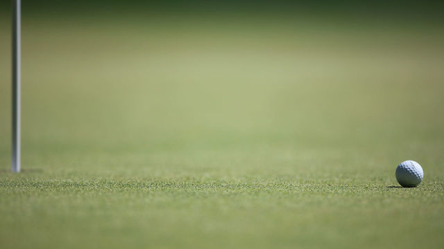 CROMWELL, CONNECTICUT- June 24: A generic image of a golf ball near the pin during the Travelers Championship Tournament at the TPC River Highlands Golf Course on June 24th, 2017 in Cromwell, Connecticut.