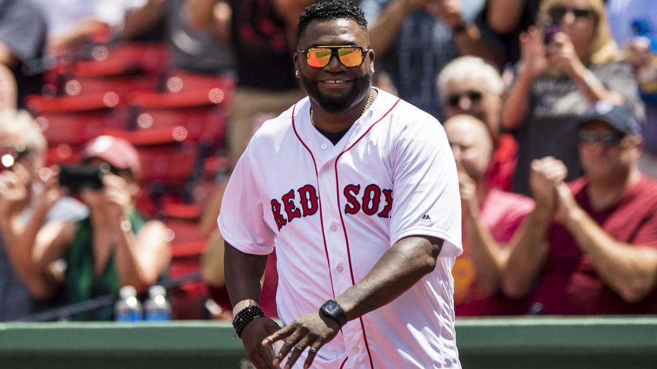 BOSTON, MA - JULY 30: Former Boston Red Sox player David Ortiz is introduced during a 2007 World Series Champion team reunion before a game against the Kansas City Royals on July 30, 2017 at Fenway Park in Boston, Massachusetts.