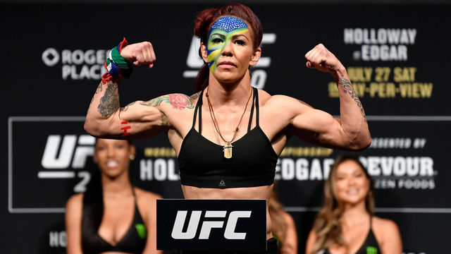 EDMONTON, AB - JULY 26: Cris Cyborg of Brazil poses on the scale during the UFC 240 weigh-in at Rogers Place on July 26, 2019 in Edmonton, Alberta, Canada.