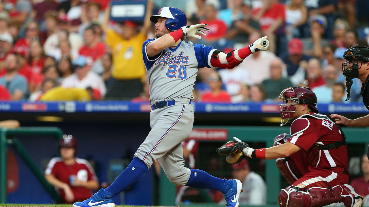 PHILADELPHIA, PA - JULY 27: Josh Donaldson #20 of the Atlanta Braves hits an RBI double against the Philadelphia Phillies during the third inning of a baseball game at Citizens Bank Park on July 27, 2019 in Philadelphia, Pennsylvania.