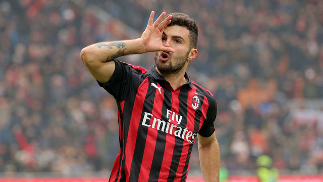 Patrick Cutrone #63 of AC Milan celebrates after scoring the his goal during the serie A match between AC Milan and Parma Calcio 1913 at Stadio Giuseppe Meazza on December 02, 2018 in Milan, Italy.