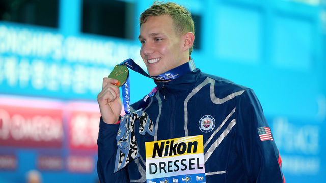GWANGJU, SOUTH KOREA - JULY 27: Gold medalist Caeleb Dressel of the United States poses during the medal ceremony for the Men's 100m Butterfly Final on day seven of the Gwangju 2019 FINA World Championships at Nambu International Aquatics Centre on July 27, 2019 in Gwangju, South Korea.