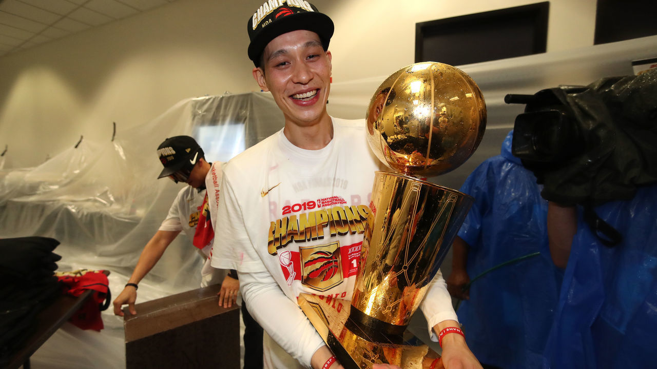 OAKLAND, CA - JUNE 13: Jeremy Lin #17 of the Toronto Raptors holds the Larry O'Brien Championship Trophy in the locker room after defeating the Golden State Warriors in Game Six of the 2019 NBA Finals on June 13, 2019 at ORACLE Arena in Oakland, California. NOTE TO USER: User expressly acknowledges and agrees that, by downloading and/or using this photograph, user is consenting to the terms and conditions of Getty Images License Agreement. Mandatory Copyright Notice: Copyright 2019 NBAE