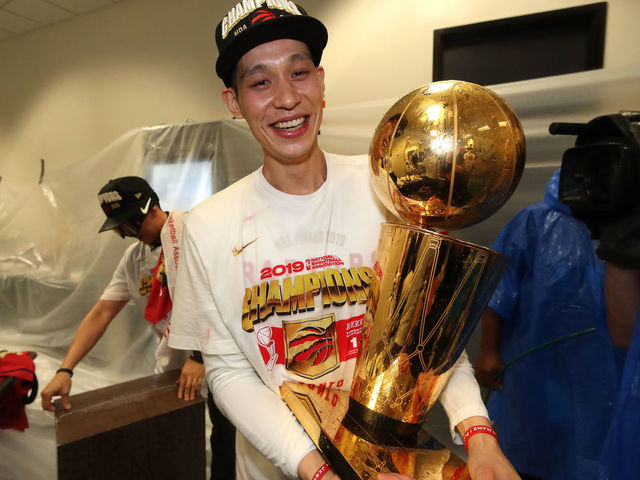 OAKLAND, CA - JUNE 13: Jeremy Lin #17 of the Toronto Raptors holds the Larry O'Brien Championship Trophy in the locker room after defeating the Golden State Warriors in Game Six of the 2019 NBA Finals on June 13, 2019 at ORACLE Arena in Oakland, California. NOTE TO USER: User expressly acknowledges and agrees that, by downloading and/or using this photograph, user is consenting to the terms and conditions of Getty Images License Agreement. Mandatory Copyright Notice: Copyright 2019 NBAE