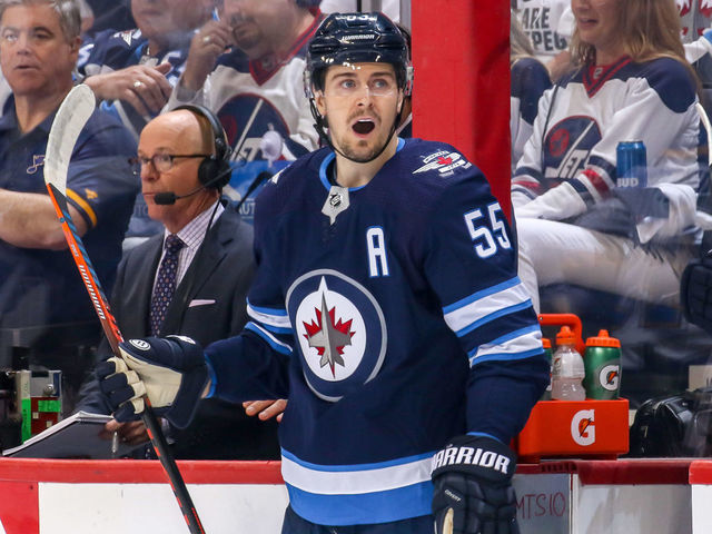 WINNIPEG, MB - APRIL 12: Mark Scheifele #55 of the Winnipeg Jets reacts after being called for a two minute minor penalty during first period action against the St. Louis Blues in Game Two of the Western Conference First Round during the 2019 NHL Stanley Cup Playoffs at the Bell MTS Place on April 12, 2019 in Winnipeg, Manitoba, Canada.