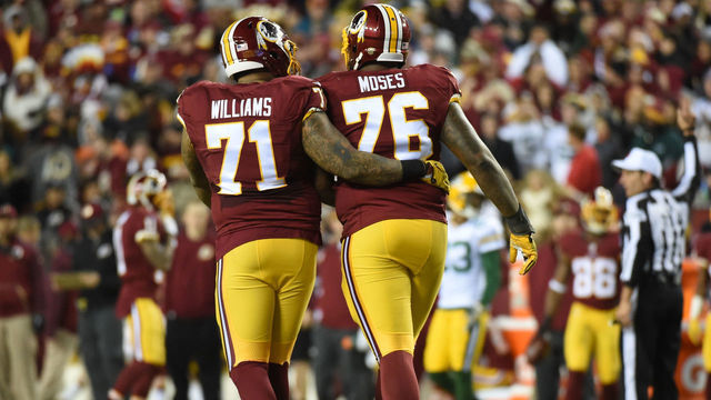 LANDOVER, MD - JANUARY, 10: Washington Redskins tackle Trent Williams (71) checks on tackle Morgan Moses (76) after he got dinged in the second quarter against the Green Bay Packers in the NFC Wild Card Game at FedEx field on January 10, 2016 in Landover, MD. (Jonathan Newton / The Washington Post via Getty Images)