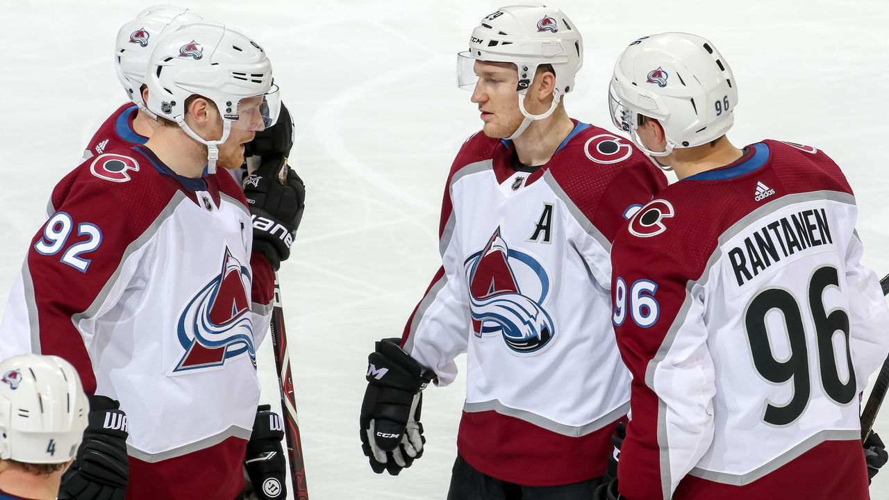 WINNIPEG, MB - JANUARY 8: Gabriel Landeskog #92, Nathan MacKinnon #29 and Mikko Rantanen #96 of the Colorado Avalanche discuss strategy during a second period stoppage in play against the Winnipeg Jets at the Bell MTS Place on January 8, 2019 in Winnipeg, Manitoba, Canada. The Jets defeated the Avs 7-4.