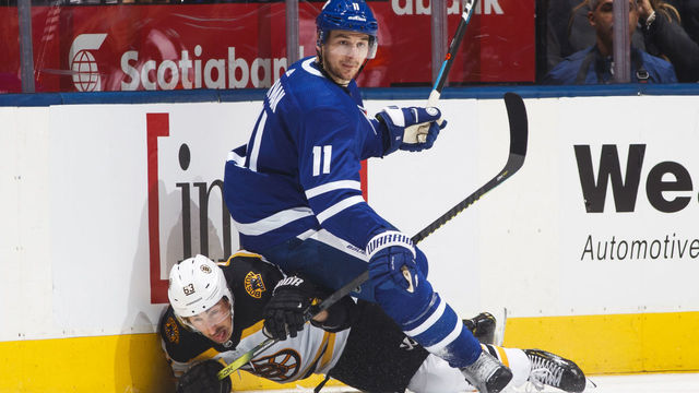 TORONTO, ON - APRIL 17: Zach Hyman #11 of the Toronto Maple Leafs battles with Brad Marchand #63 of the Boston Bruins during the third period during Game Four of the Eastern Conference First Round during the 2019 NHL Stanley Cup Playoffs at the Scotiabank Arena on April 17, 2019 in Toronto, Ontario, Canada.