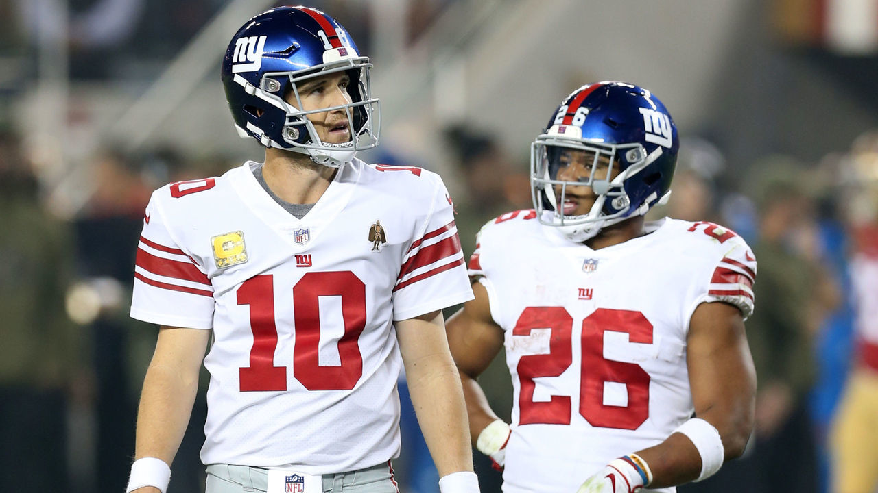 SANTA CLARA, CA - NOVEMBER 12: Eli Manning #10 and Saquon Barkley #26 of the New York Giants look on during the game against the San Francisco 49ers at Levi Stadium on November 11, 2018 in Santa Clara, CA. The Giants defeated the 49ers 27-23.