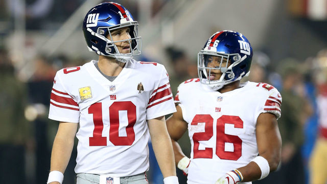SANTA CLARA, CA - NOVEMBER 12: Eli Manning #10 and Saquon Barkley #26 of the New York Giants look on during the game against the San Francisco 49ers at Levi Stadium on November 11, 2018 in Santa Clara, CA. The Giants defeated the 49ers 27-23.