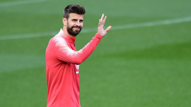 MANCHESTER, ENGLAND - APRIL 09: Gerard Pique of Barcelona waves during a FC Barcelona training session, on the eve of their Champions League Quarter Final match against Manchester United, at Old Trafford on April 09, 2019 in Manchester, England.