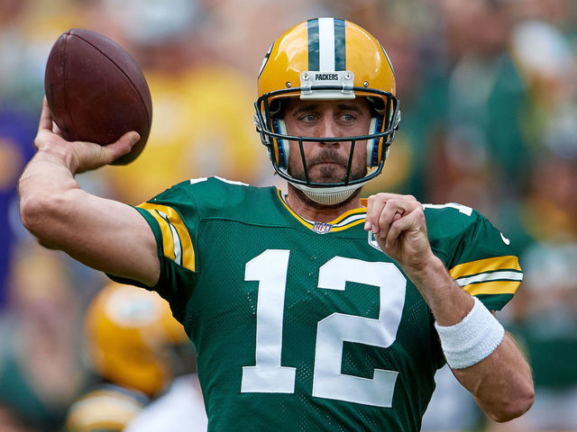 GREEN BAY, WI - SEPTEMBER 16: Green Bay Packers Quarterback Aaron Rodgers (12) throws the football during warm-ups prior to game action during an NFL game between the Minnesota Vikings and the Green Bay Packers on September 16, 2018 at Lambeau Field, in Green Bay, Wisconsin. The Green Bay Packers and the Minnesota Vikings played to a 29-29 tie.