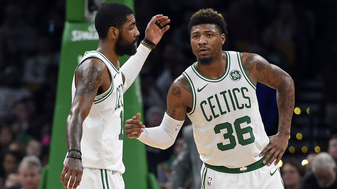 BOSTON, MA - JANUARY 21: ""Boston Celtics teammates Kyrie Irving, left, and Marcus Smart celebrate during their 107-99 win over the Miami Heat an NBA basketball game at TD Garden in Boston, Massachusetts on January 21, 2019. (Staff Photo By Christopher Evans/MediaNews Group/Boston Herald)