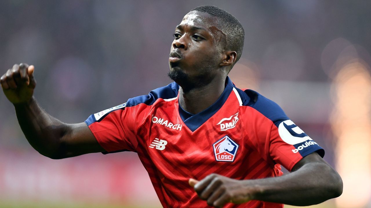Lille's Ivorian forward Nicolas Pepe celebrates after scoring a goal during the French L1 football match between Lille (LOSC) and Angers (SCO) at the Pierre-Mauroy Stadium in Villeneuve d'Ascq, near Lille, northern France, on May 18 2019.