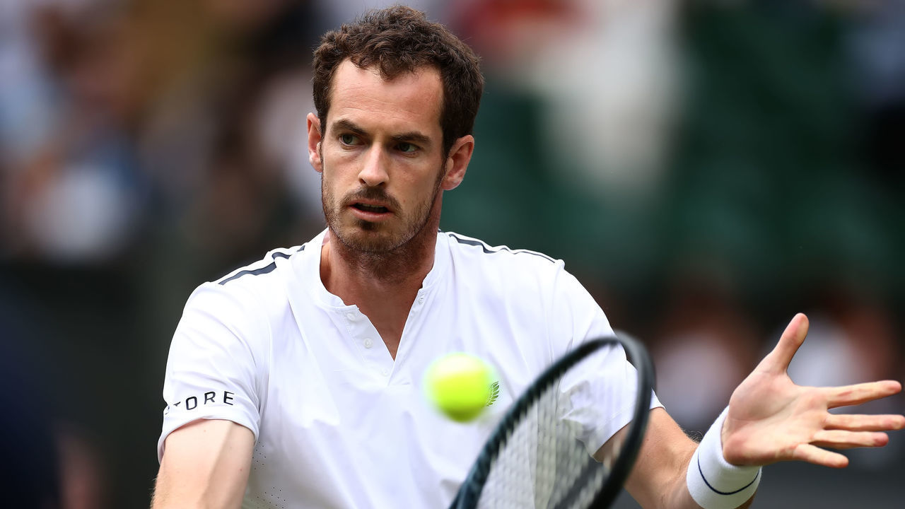9th July 2019, The All England Lawn Tennis and Croquet Club, Wimbledon, England, Wimbledon Tennis Tournament, Day 8; Andy Murray (GBR) with a volley at the net during his mix doubles match with Serena Williams (USA)