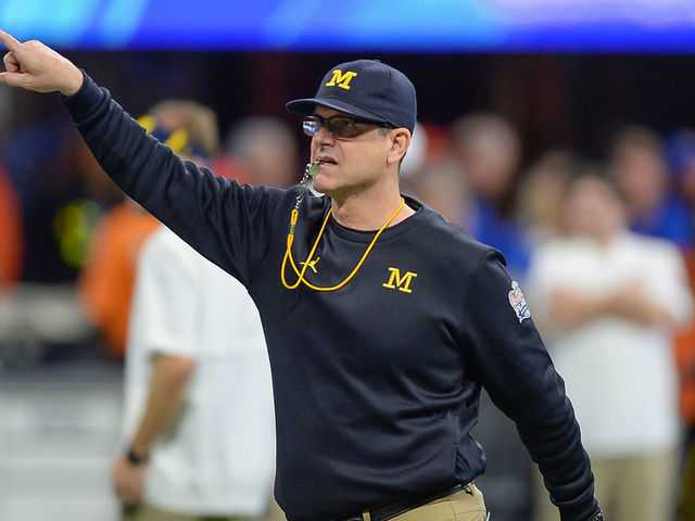 ATLANTA, GA DECEMBER 29: Michigan head coach Jim Harbaugh on the sideline during the Chick-fil-A Peach Bowl between the Michigan Wolverines and the Florida Gators on December 29th, 2018 at Mercedes-Benz Stadium in Atlanta, GA.
