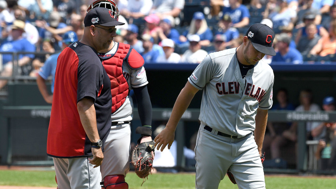 KANSAS CITY, MO. - JULY 28: Cleveland Indians starting pitcher Trevor Bauer (47) heads for the dugout after being relieved in the fifth inning by Cleveland Indians manager Terry Francona during a Major League Baseball game between the Cleveland Indians and the Kansas City Royals on July 28, 2019, at Kauffman Stadium, Kansas City, MO.