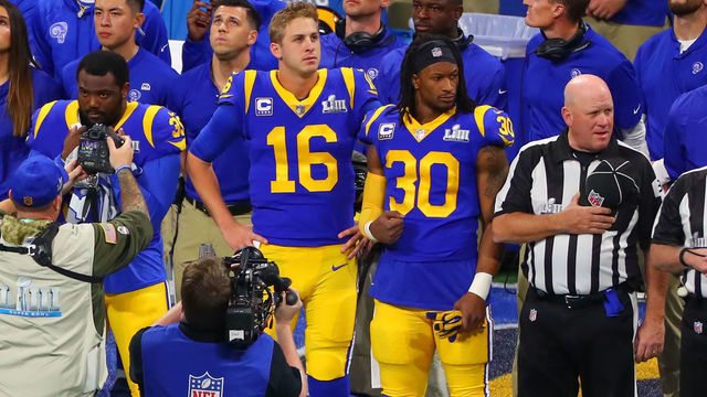 ATLANTA, GA - FEBRUARY 03: Los Angeles Rams quarterback Jared Goff (16) and Los Angeles Rams running back Todd Gurley (30) during the National Anthem prior to Super Bowl LIII between the Los Angeles Rams and the New England Patriots on February 3, 2019 at Mercedes Benz Stadium in Atlanta, GA.