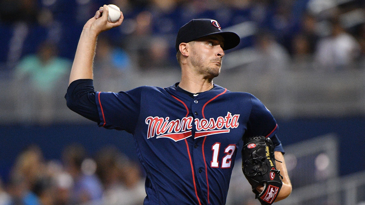 MIAMI, FL - JULY 30: Jake Odorizzi #12 of the Minnesota Twins delivers a pitch in the first inning against the Miami Marlins at Marlins Park on July 30, 2019 in Miami, Florida.