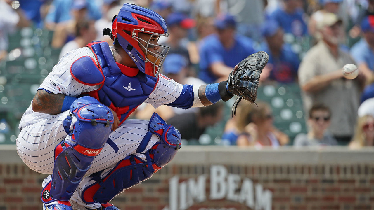 CHICAGO, ILLINOIS - JULY 19: Martin Maldonado #38 of the Chicago Cubs catches a warm-up pitch against the San Diego Padres at Wrigley Field on July 19, 2019 in Chicago, Illinois.