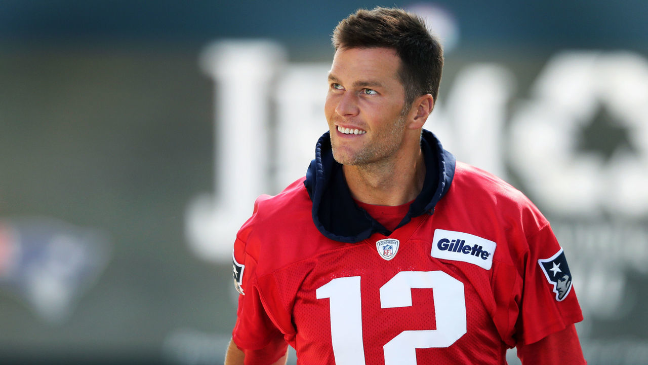 FOXBOROUGH, MA - JULY 25: New England Patriots quarterback Tom Brady comes up the stairs and heads for the field for the first workout at Patriots training camp at Gillette Stadium in Foxborough, MA on July 25, 2019.